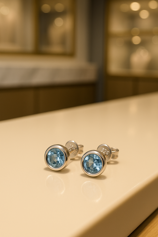 Blau-Topaz Ohrstecker 6 mm in 925 Silber