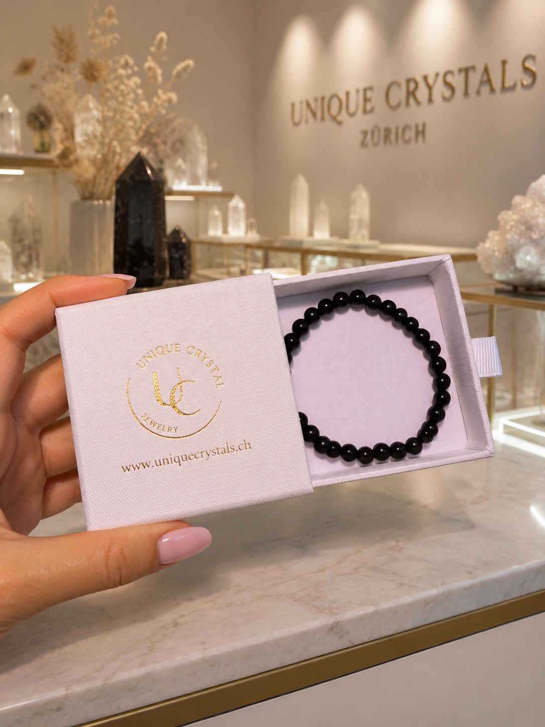 Faceted Tourmaline Bracelet – Protection, Elegance, and Grounding 🌌