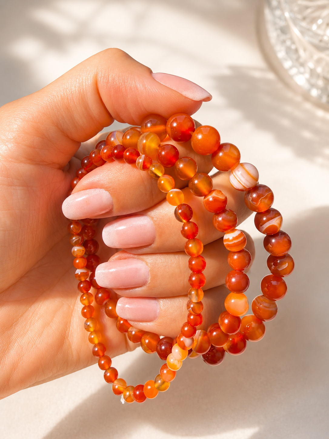 Handgeknüpftes Karneol-Armband in warmem Orange mit Edelsteinperlen