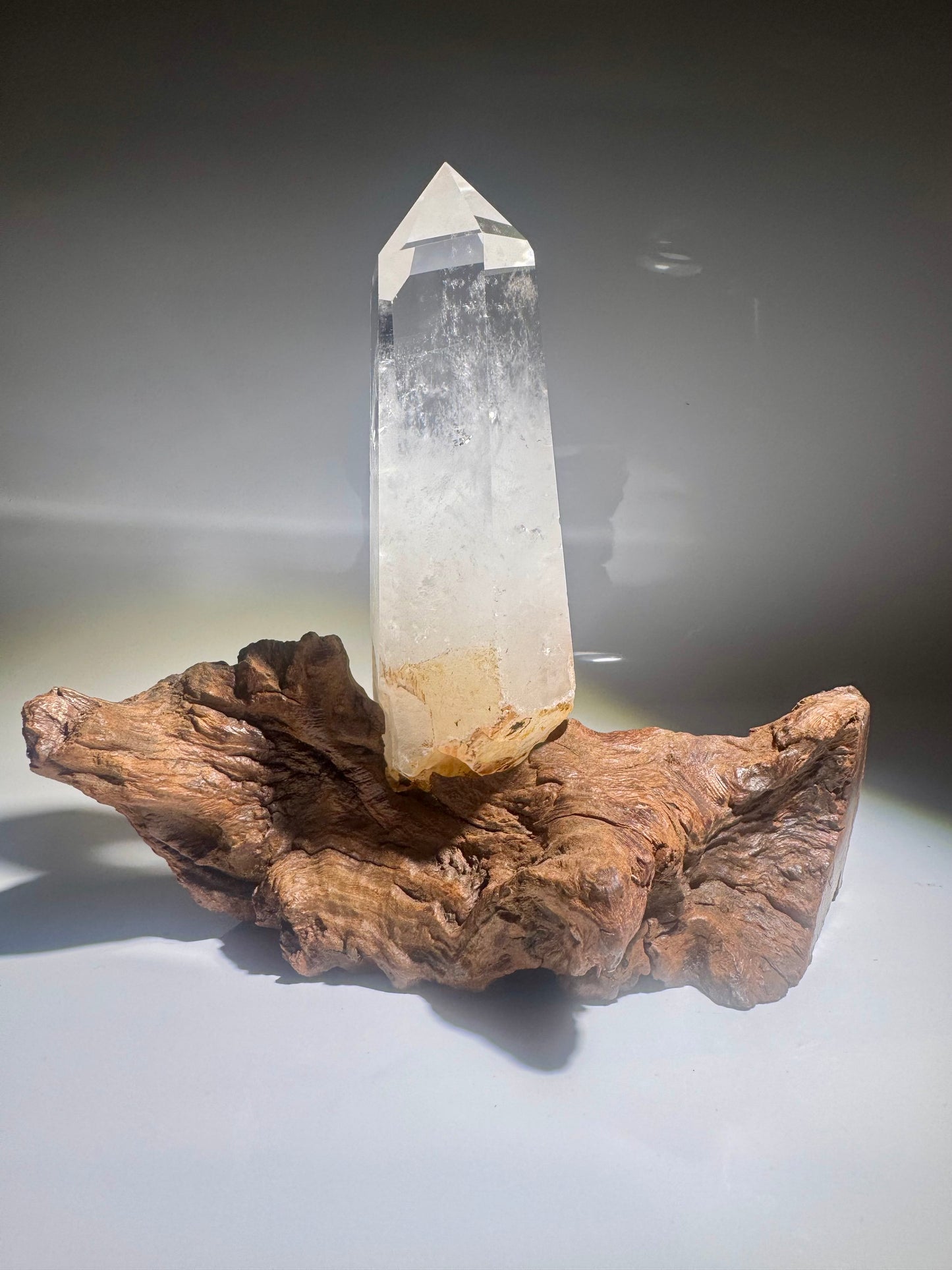 Enchanting rock crystal point crystal 19 cm on root stand