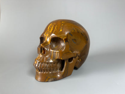 Super realistischer Totenkopf aus Tiger Auge Kristall 12cm - 1.47kg