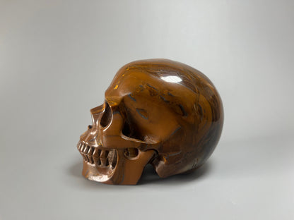 Super realistischer Totenkopf aus Tiger Auge Kristall 12cm - 1.47kg