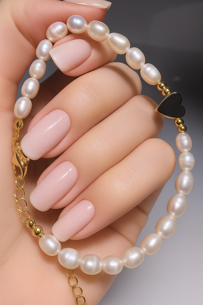 Vergoldetes Edelstahlarmband mit echten Süsswasserperlen – 22 cm grössenverstellbar 